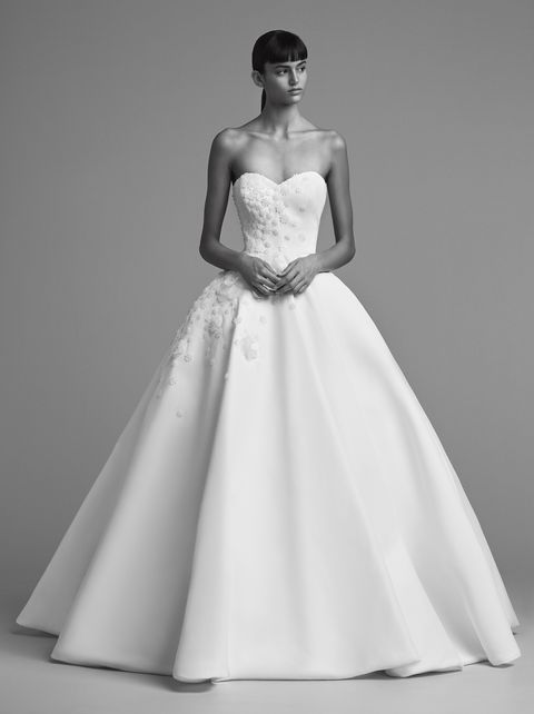 Gown, Wedding dress, Clothing, Dress, Fashion model, Bridal party dress, Bridal clothing, Photograph, Bridal accessory, White, 