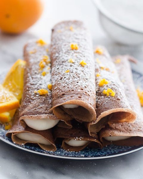 chocolate crepes with orange cream cheese filling and orange slice