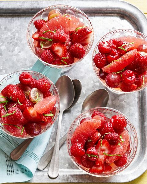 fruit salad with grapefruit vanilla syrup in individual glasses on tray