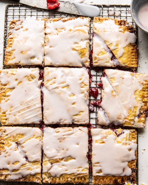 giant strawberries and cream pop tart on wire rack