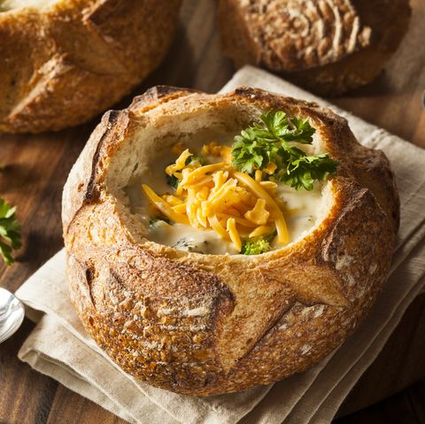 homemade broccoli and cheddar soup in a bread bowl