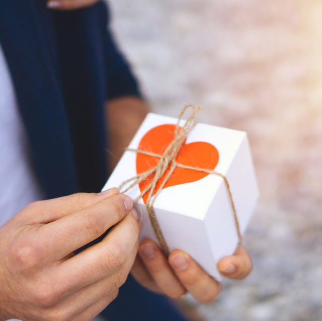 long distance valentines day - man with box with heart on it