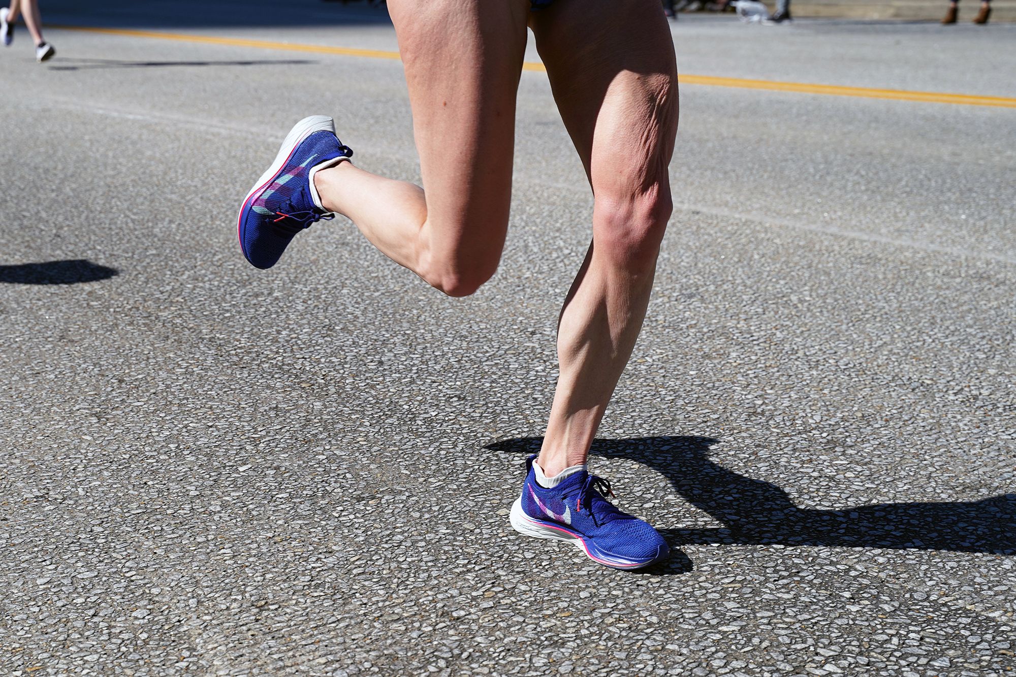 what kind of shoes do marathon runners wear