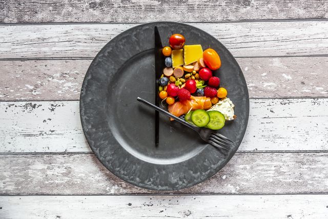 variety of food on round plate, intermittent fasting