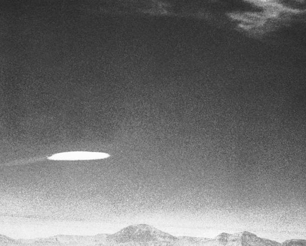 ufo flying over new mexico in black and white image
