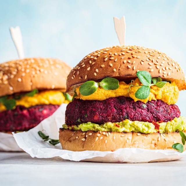 vegan beetroot burger with sweet potato sauce and guacamole plant based diet concept