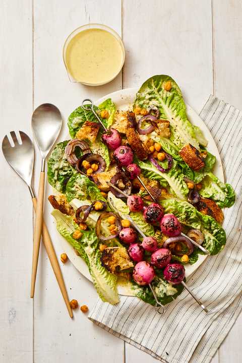 vegan caesar salad with roasted radishes, corn, and onions