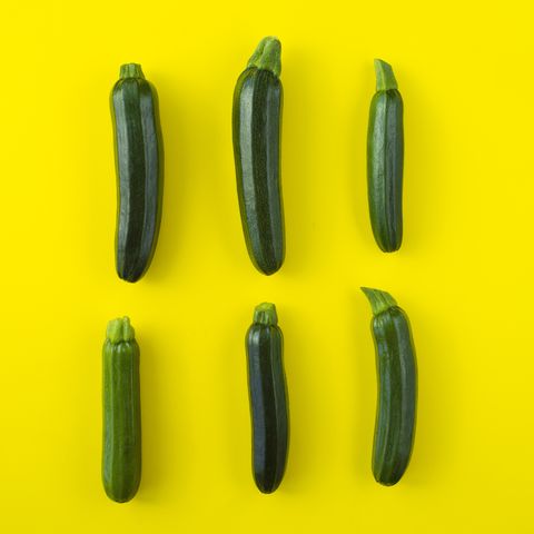 zucchini on yellow background