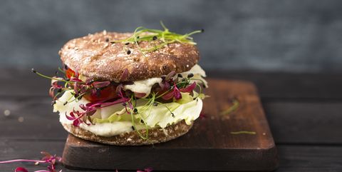 Veggie Burger, vegan, with salad, radish, tomato, rock chive