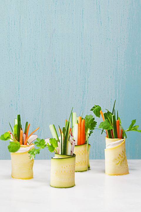 veggie matchsticks wrapped up in yellow and green squash ribbons