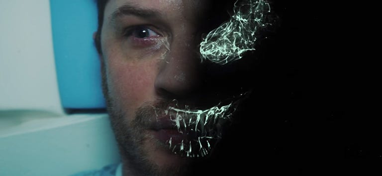 https://hips.hearstapps.com/hmg-prod.s3.amazonaws.com/images/venom-tom-hardy-marvel-primer-trailer-1518099897.jpg?crop=0.876xw:0.959xh;0.0344xw,0.0163xh&resize=768:*