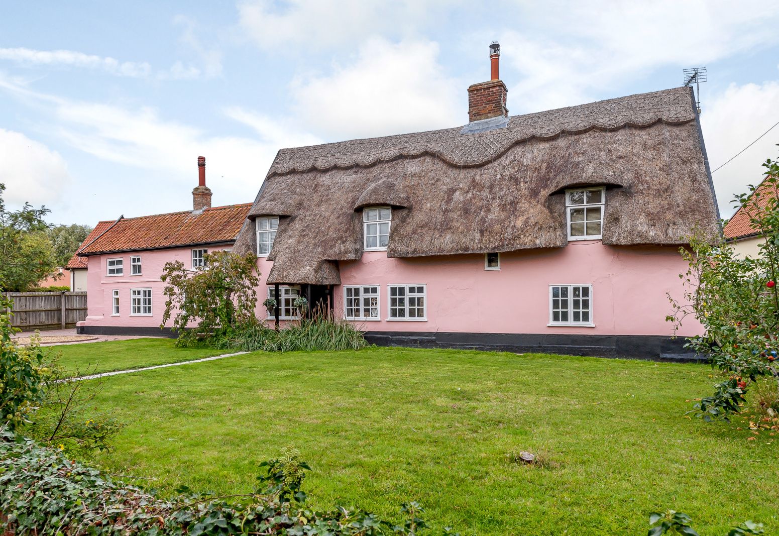 this-charming-pink-thatched-cottage-is-for-sale-in-a-tiny-norfolk