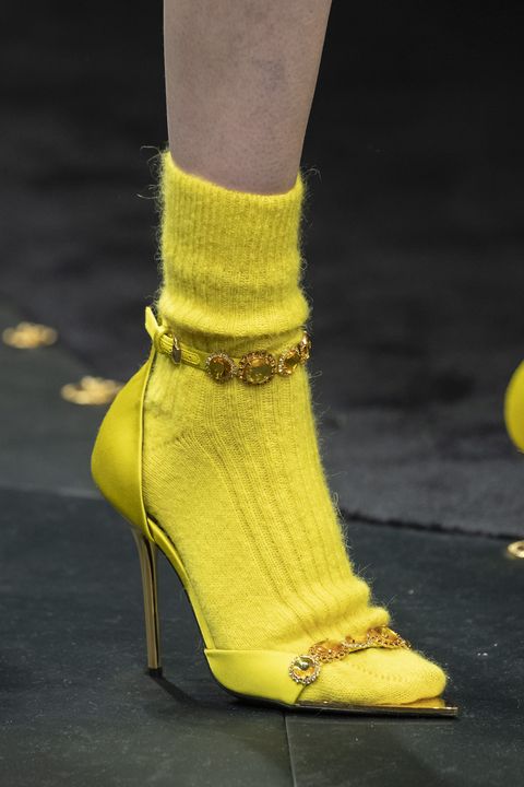 Footwear, Yellow, Fashion, Shoe, Leg, Haute couture, High heels, Joint, Ankle, Runway, 