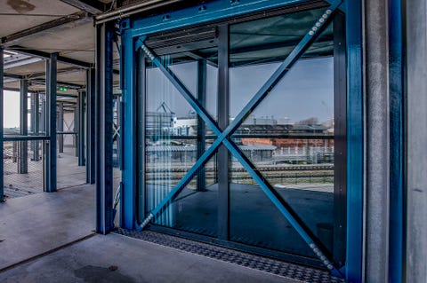 Blue, Iron, Architecture, Metal, Urban area, Door, Building, City, Glass, Steel, 