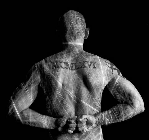 View of a Man's Back With His Arms Behind view of a man's back with his arms behind