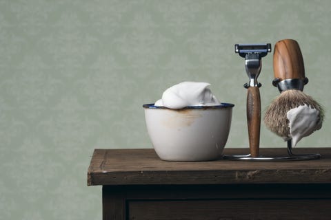 vintage wet Shaving Tools on a wooden Table