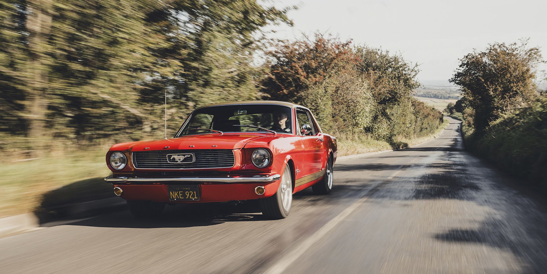 Silent Stallion: Driving an All-Electric 1965 Ford Mustang