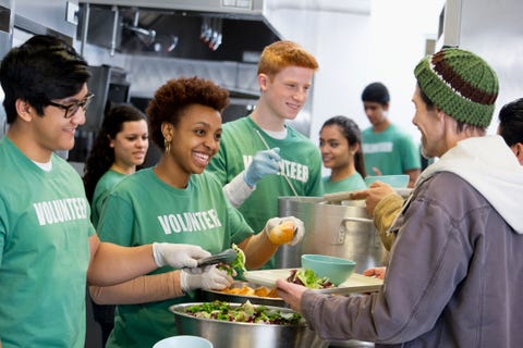 Volunteers working in soup kitchen