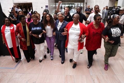 activists demonstrate against state level republicans trying to pass restrictive voting rights laws