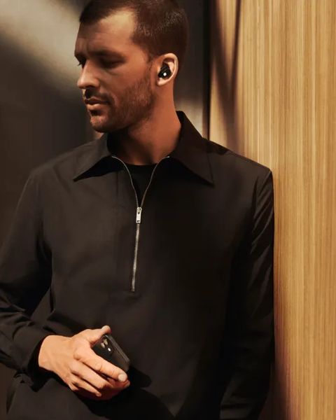 man wearing montblanc mtb 03 in ear headphones