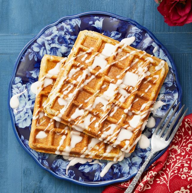 waffles with glaze on blue plate and blue background
