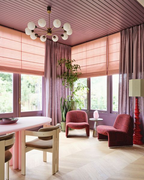 amsterdam home of actor carice van houten designed by nicole dohmen of atelier nd interior dining room window treatments helene blanche roman shades Étoffe curtains table sabine marcelis dining chairs vintage afra and tobia scarpa for gavina, in pierre frey mohair also used in the study