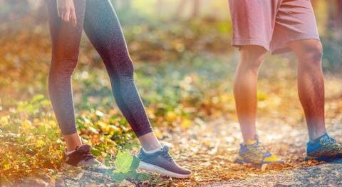 Sports attractive couple getting ready to run and exercise outdoors