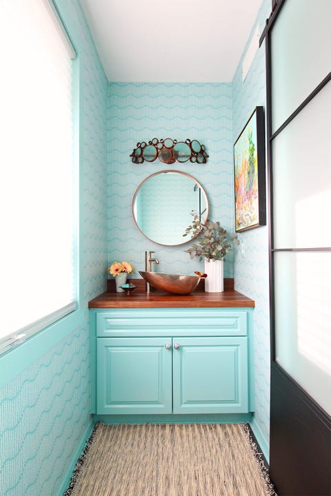 teal wallpaper powder room