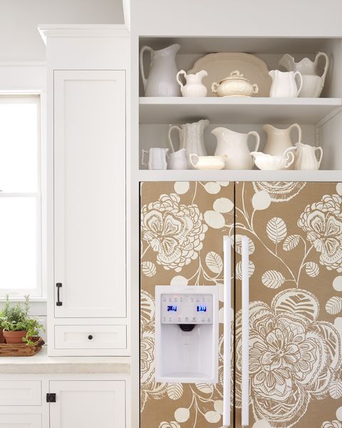 wallpaper covered refrigerator