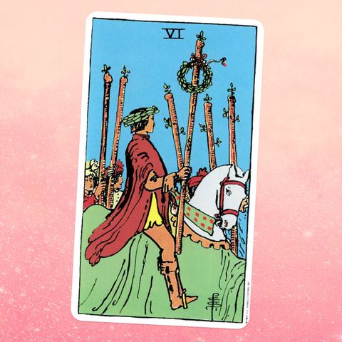 the tarot card the Six of Wands, showing a person on a horse holding a wooden staff with a wreath of leaves attached people holding five other staffs stand on the ground nearby