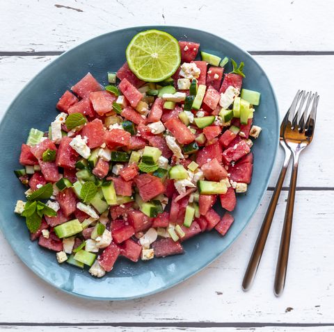 watermelon salad with feta, cucumber, mint and lime dressing on plate
