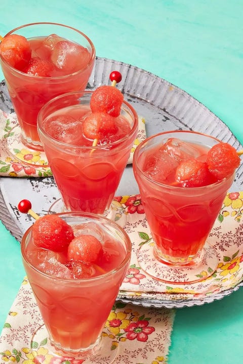 three glasses of watermelon wine coolers with watermelon balls in them