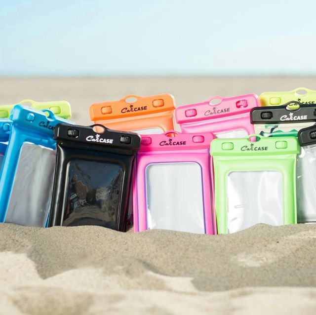 group of waterproof phone pouches in sand