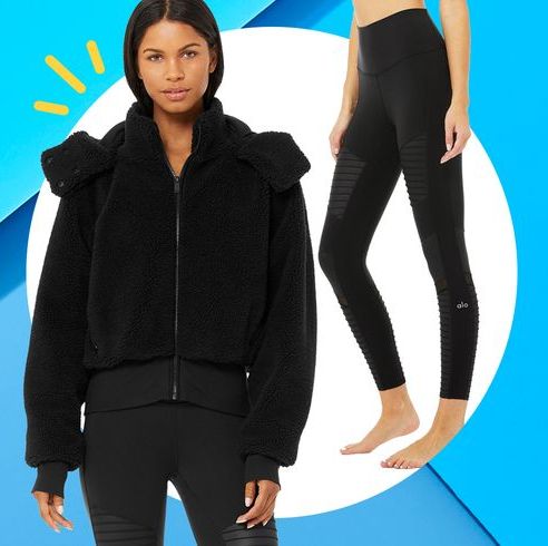 person wearing black fleece hoodie jacket with sherpa fabric and zipup and highwaisted moto black leggings alo yoga