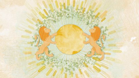 wheat and leaves encircling two lions holding a globe