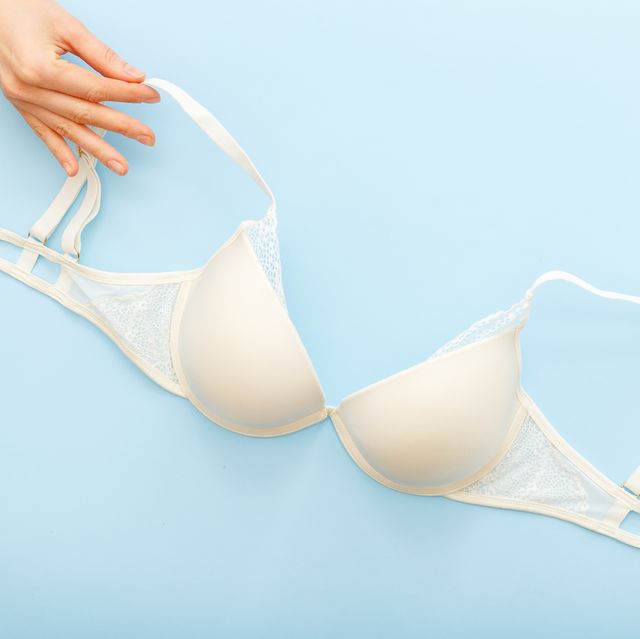 best support bra white bra in female hand