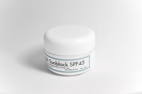 spf meaning white jar of sunblock cream