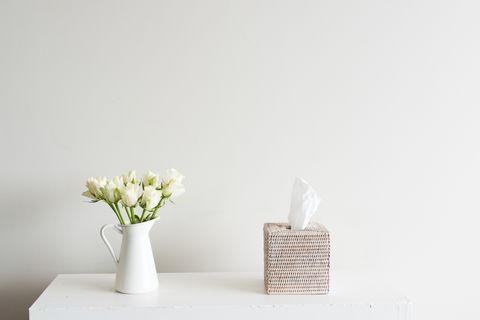 White roses and tissue box