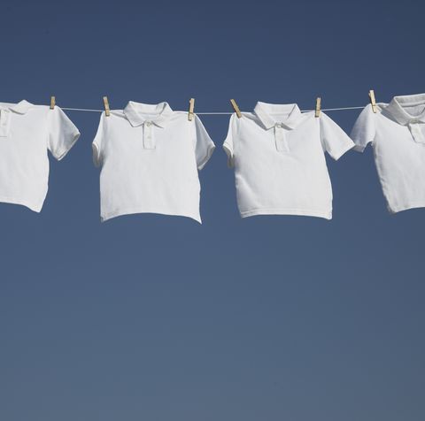 White t-shirts on a washing line.