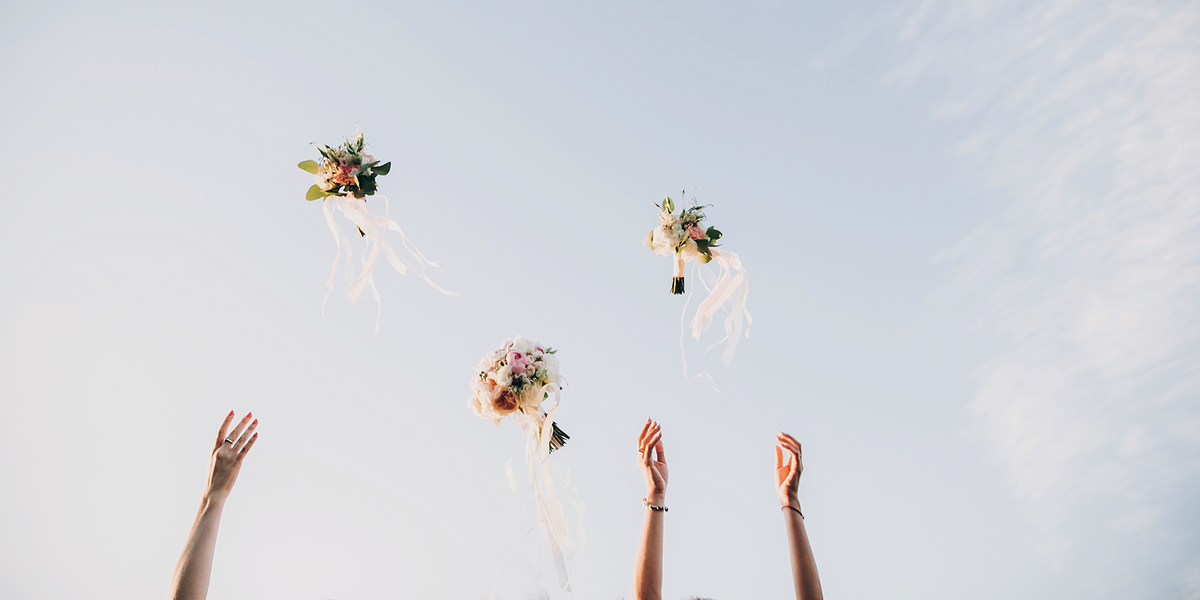 why-does-the-bride-throw-the-bouquet