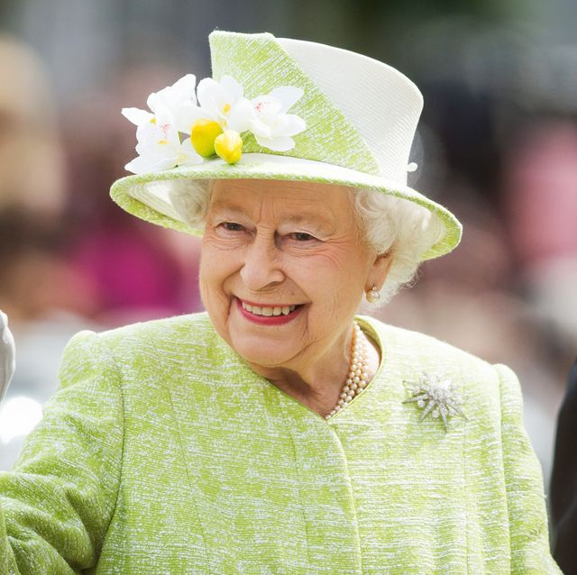 windsor, england   april 21  queen elizabeth ii waves during a walk about around windsor on her 90th birthday on april 21, 2016 in windsor, england  photo by samir husseinwireimage