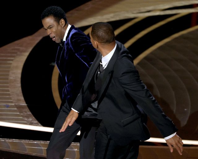 will smith attacks chris rock in what is already the viral photo of the year