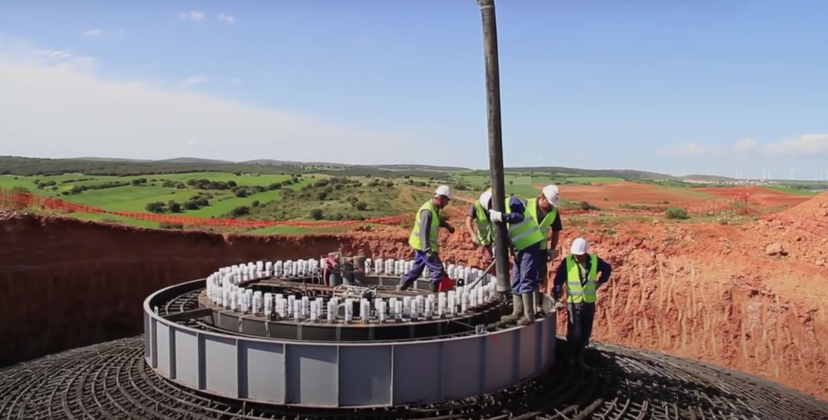 Watch Contractors Hypnotically Build an Entire Wind Turbine Farm