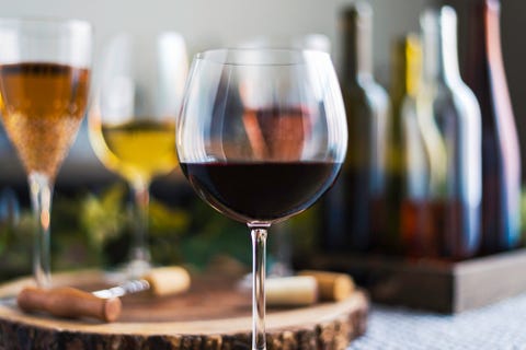 wine tasting theme with various bottles of wine and glasses