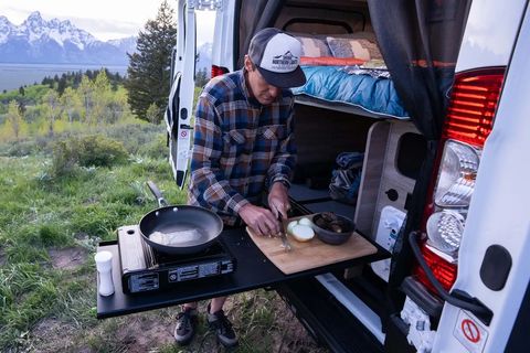 winnebago solis npf camper van with cooking surface extended out from rear