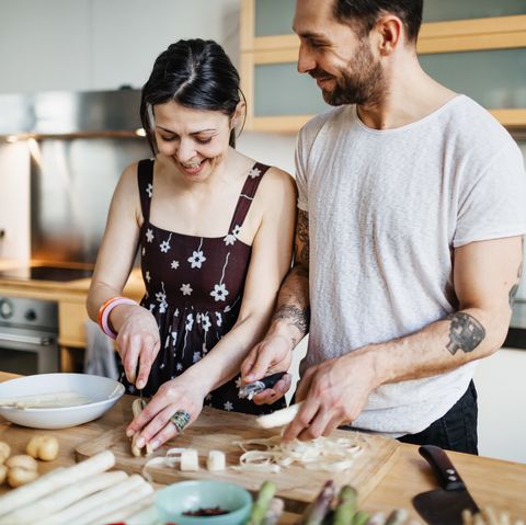 couple on a winter date have a cooking competition