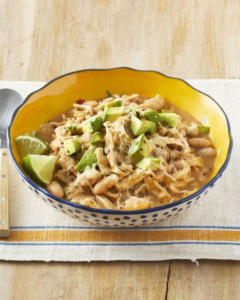 slow cooker white chicken chili in yellow bowl