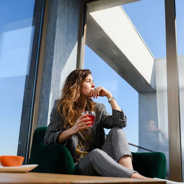 woman drink breakfast tea in modern house