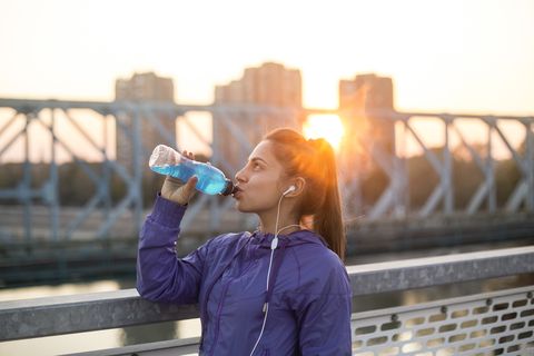 Woman drinking vitamin water