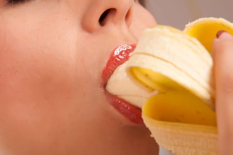 woman eating banana royalty 